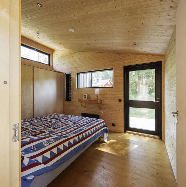 Bedroom with wooden surfaces