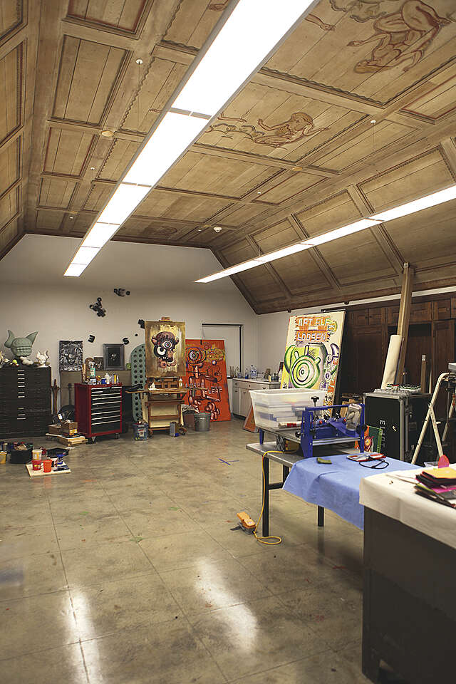 Interior of a studio space with art works