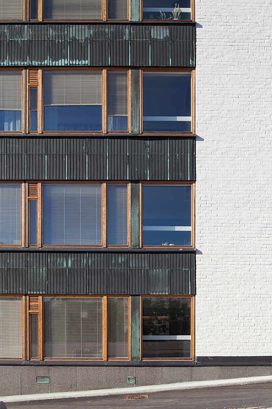 Stripe window detail of the copper-clad office