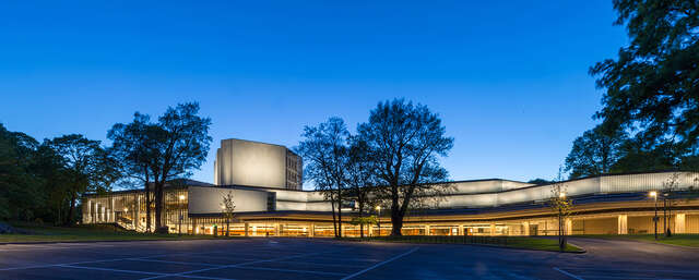 Illuminated facade during the evening.