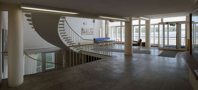 Spiral staircase in the main entrance hall catches the attention.