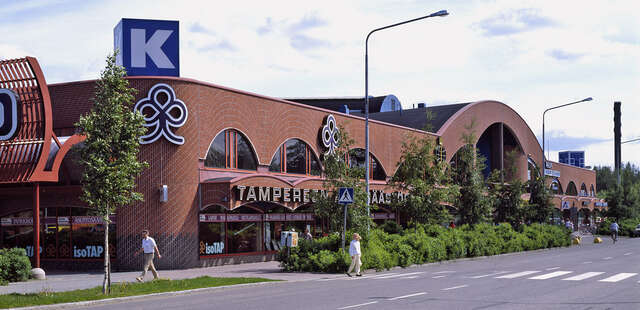 Red-Brick commercial building with arch details.