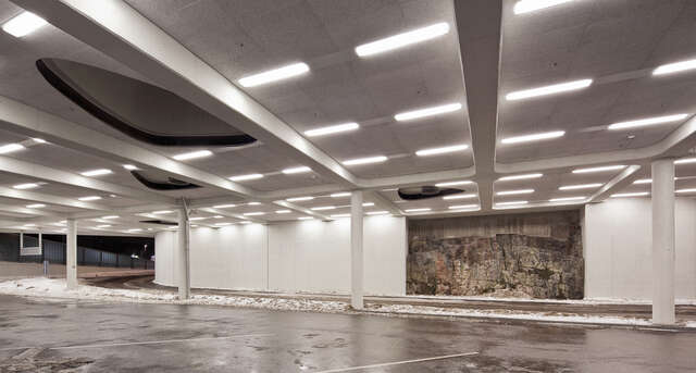 Undergroung area with parking space and illuminated ceiling
