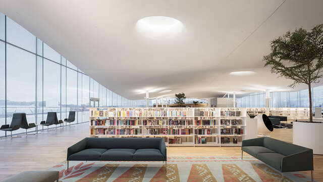 Comfortable interior of the library with bookshelves and seating arrangements.