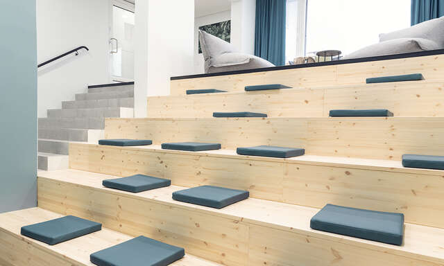 Large wooden steps meant for seating.