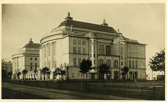 Old black and white picture of a grand building.