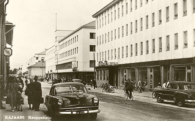 A black and white photo showcasing the street view of the building block.