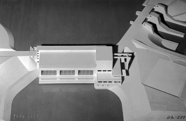 Black and white picture of a white cardboard model of the power plant.