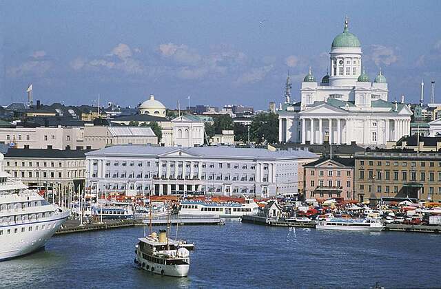 View of the Helsinki cathedral and surrounding buildings from the sea.