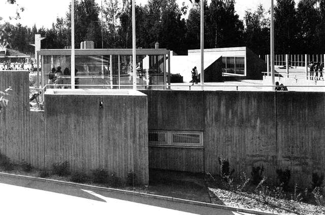 Open-air swimming pool area from the east