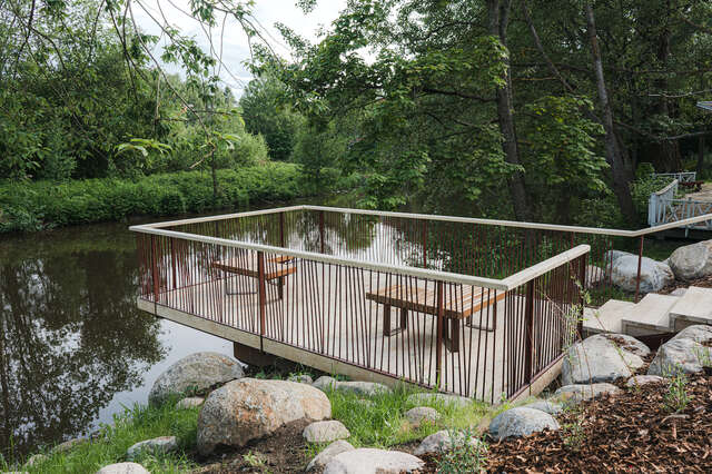 A wooden deck with benches