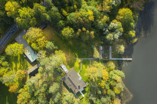 Aerial view of a building surrounded by nature