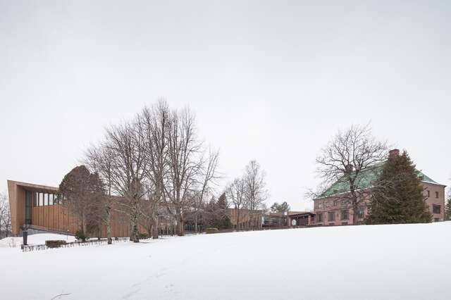 Different style buildings in a snowy landscape