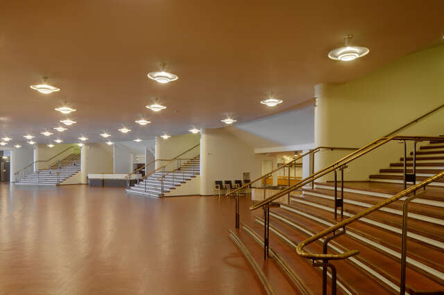 Entrance hall with staircases and ceiling lights