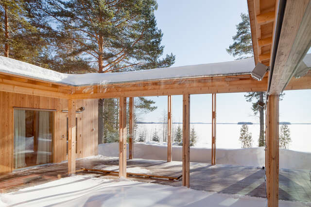 Cental atrium topped with snow and pines behind