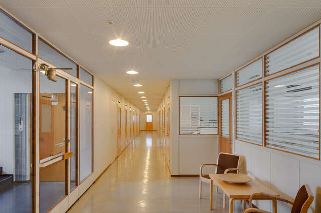 Office corridor with ceiling spotlights