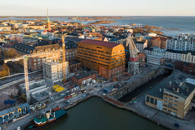 Aerial view from the northwest, office building in the middle.