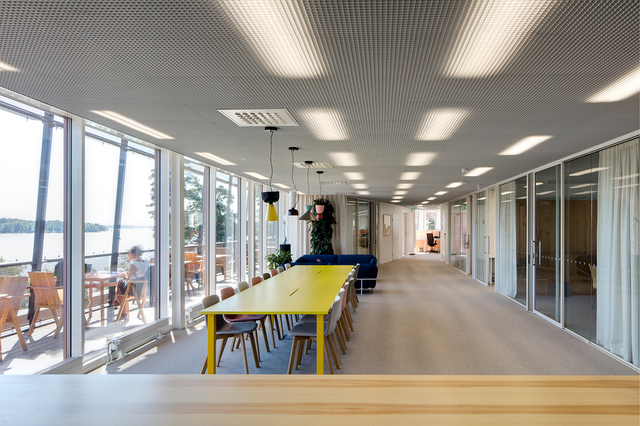 Room with large yellow table