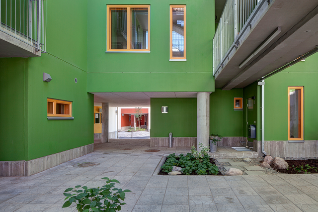 A building which has a green facade.