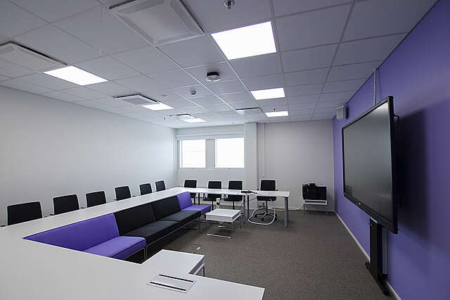meeting room with purple details.