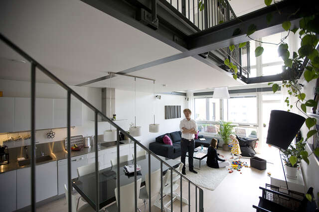 Black and white kitchen and living room area.