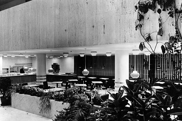 Cafe with concrete and tile elements.