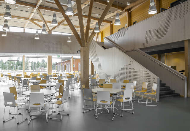 School canteen with white and yellow elements android and concrete structures.
