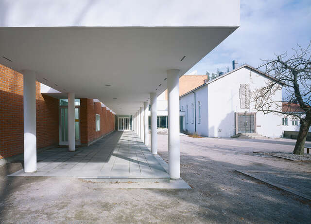 Extending roof over the entrance.