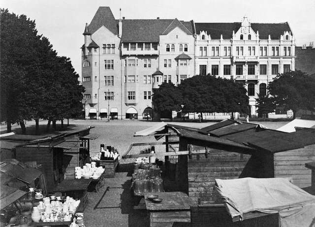 Market place and two residential buildings