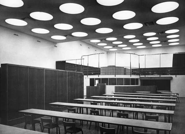 room with long desk rows.