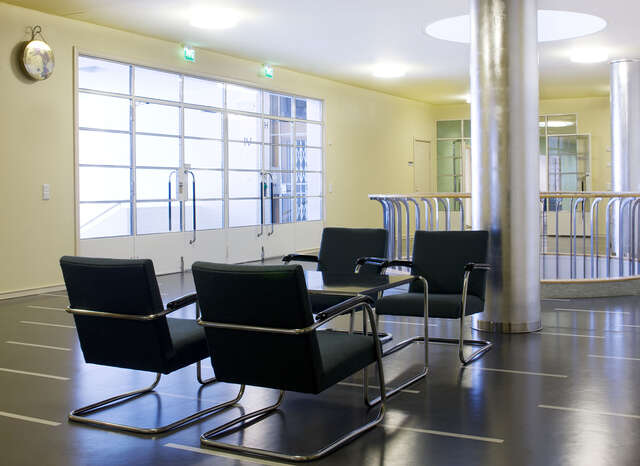 Seating arrangement in the middle of a hall.