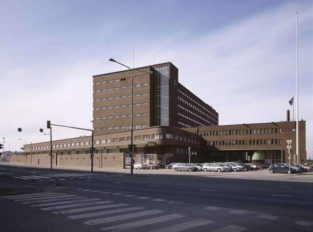 Street view of a redbrick factory building.