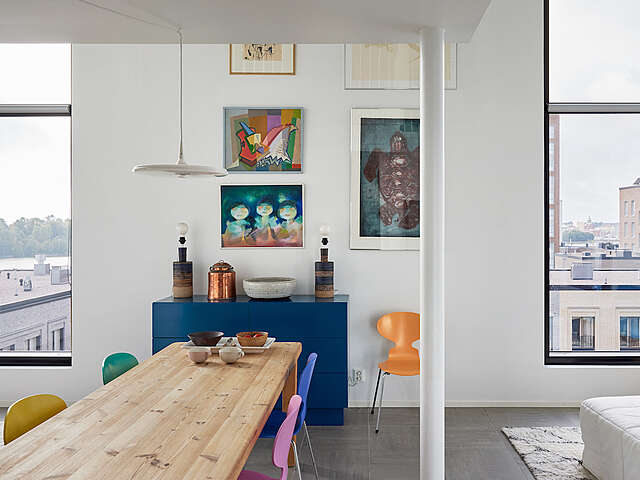 A room with a wooden table