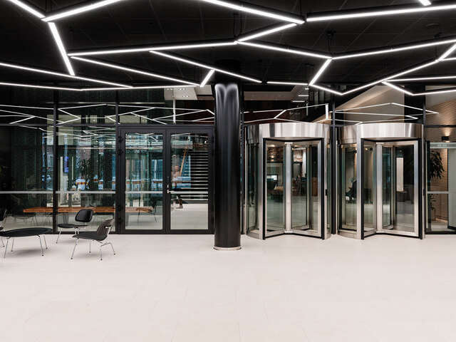 Entrance of the office building with glass doors.