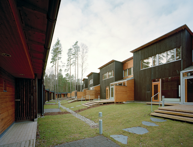 Wooden houses and grass