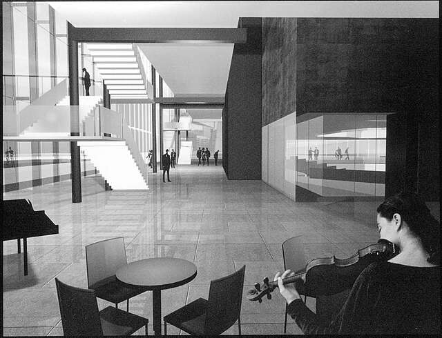 A violinist plays in the right corner, people walk in the hallway.