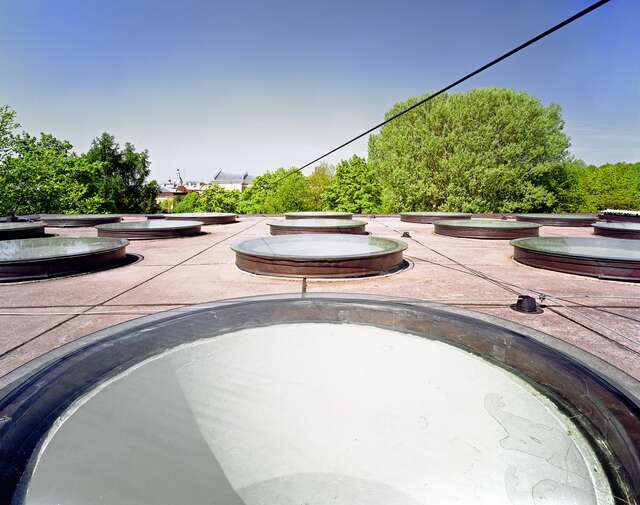Round ceiling windows on the roof.