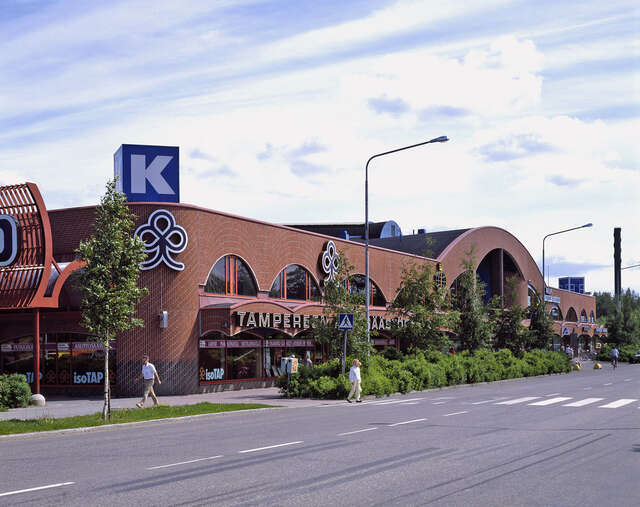 Red-Brick commercial building with arch details.