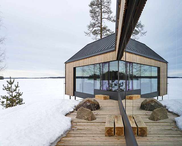 Picture from the terrace, snow. The house is surrounded by snow on a winter day.