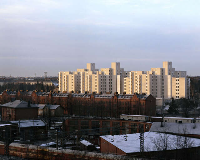 Birds eye view of the apartment complex and its surroundings.