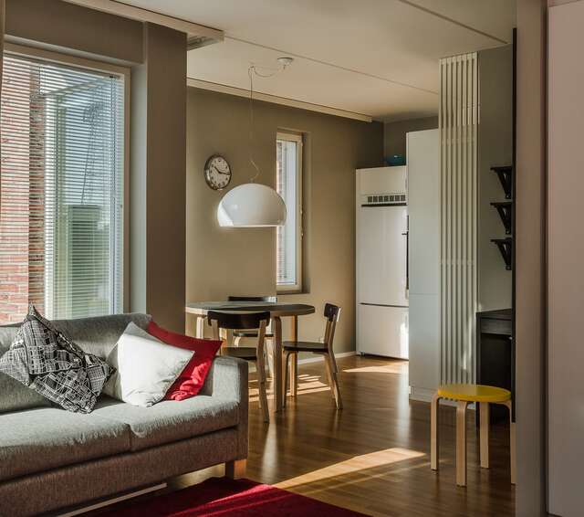 Beige interior with white, red and yellow elements.