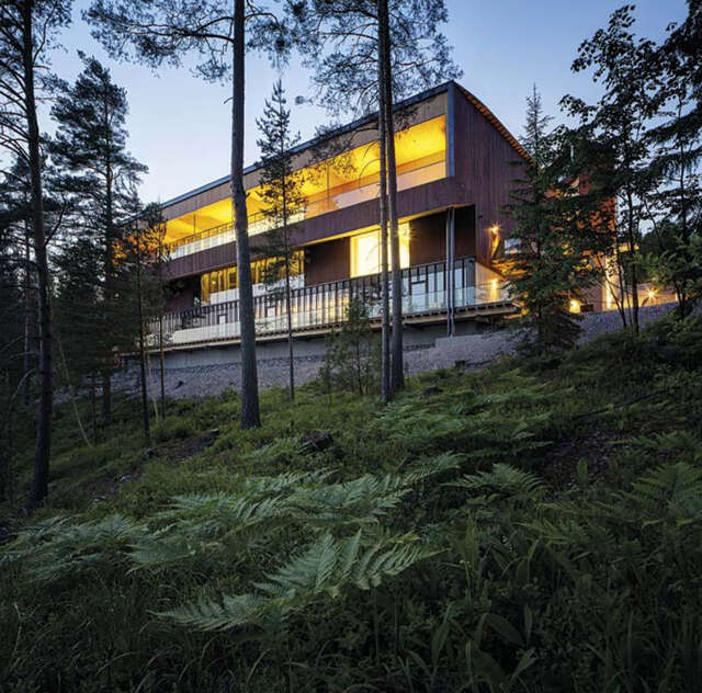 Balcony opens to the woods of the Nuuksio National Park