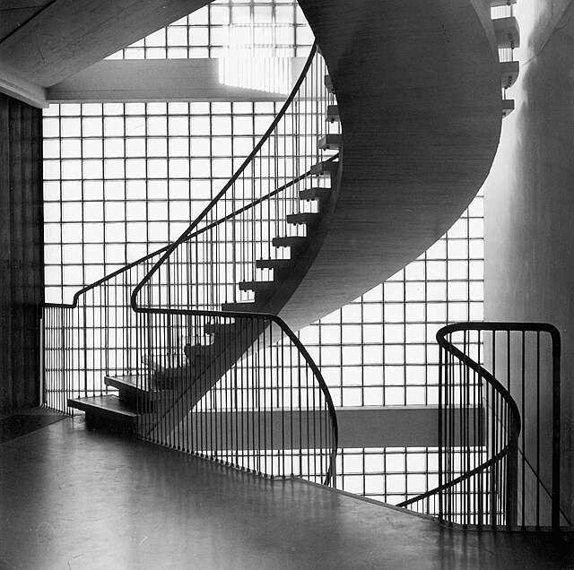 Spiral staircase in an industrial surrounding.