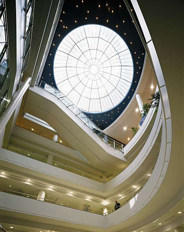 View to the ceiling window overlooking the different story railings.