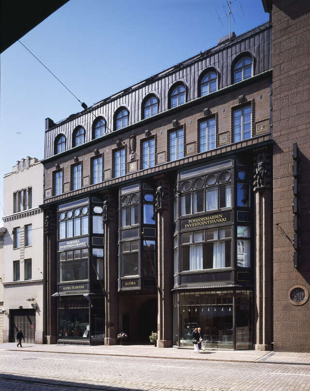 Streetview with a commercial building with big windows