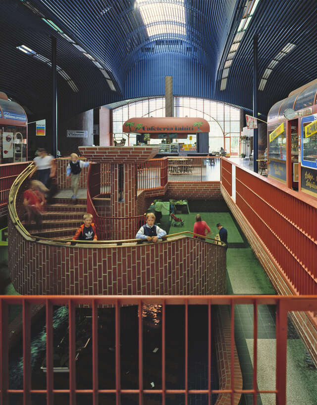 Dark interior with red green and blue details.