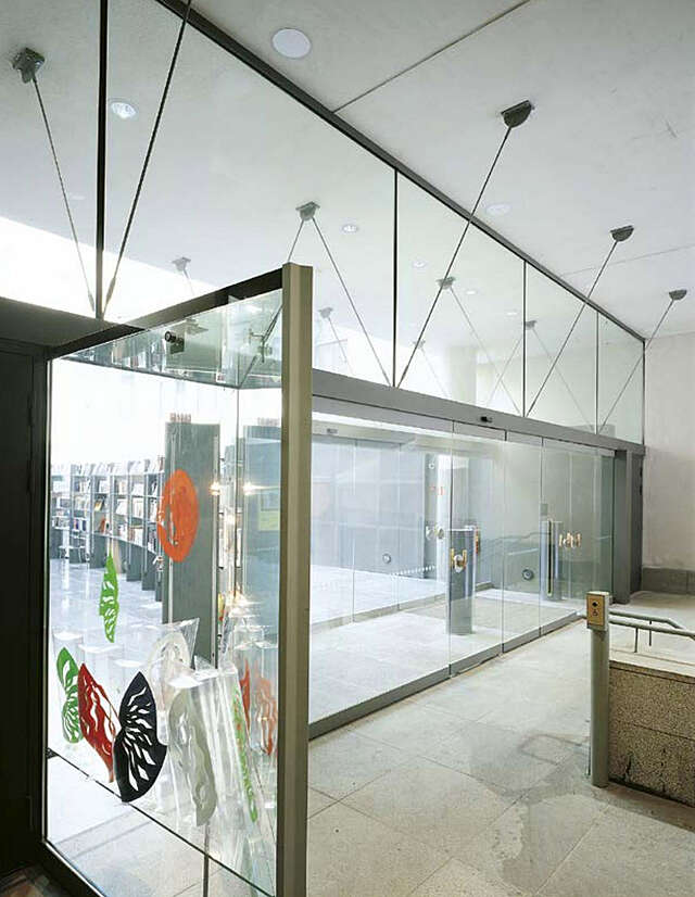 Glass wall and open glass door.