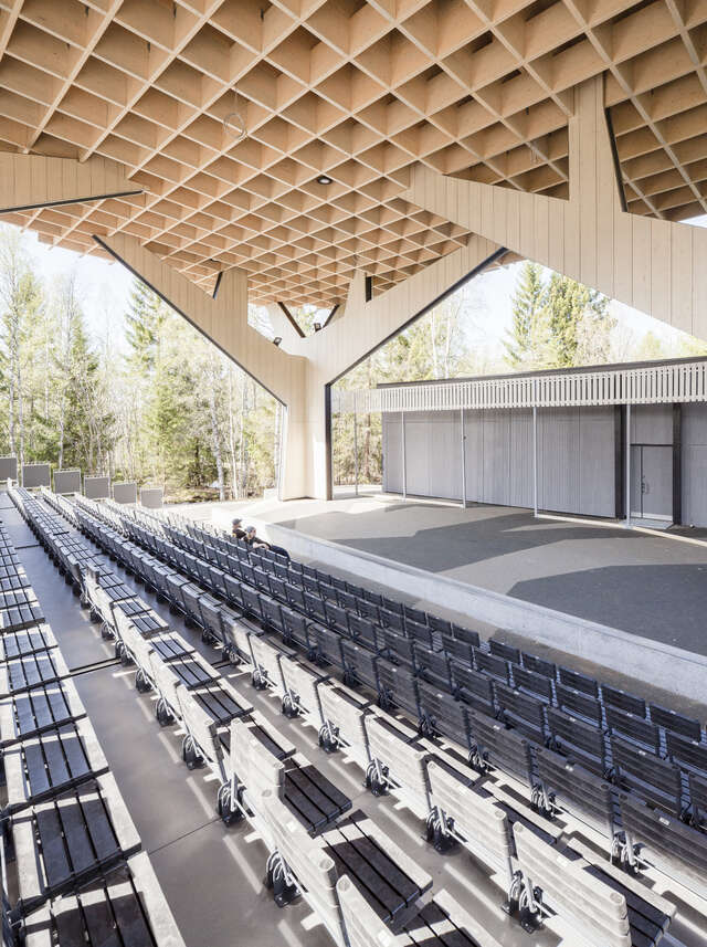 Seating and stage covered with wooden canopy