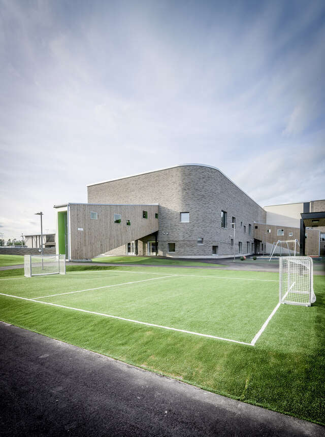Football pitch at the side of the building.