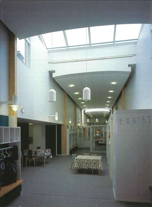 Inner street with tables and skylight through the lantern
